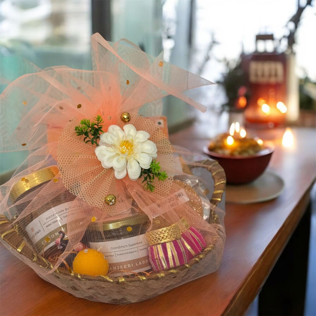 Premium Festive Gift Hamper – Gourmet Sweets & Decor Wrapped in Elegant Peach Net
